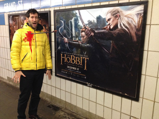 Illustration for article titled Man pretends to be shot by violent movie posters
